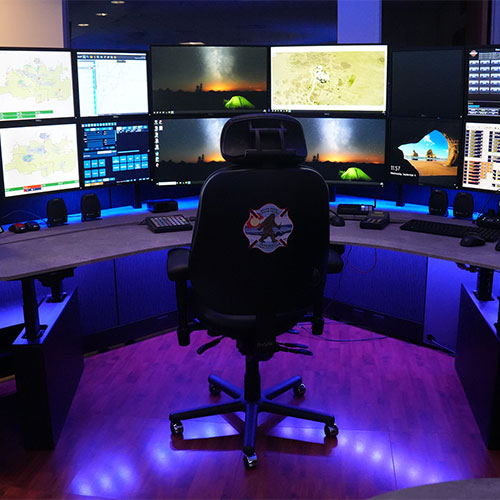 computer chair in front of monitors